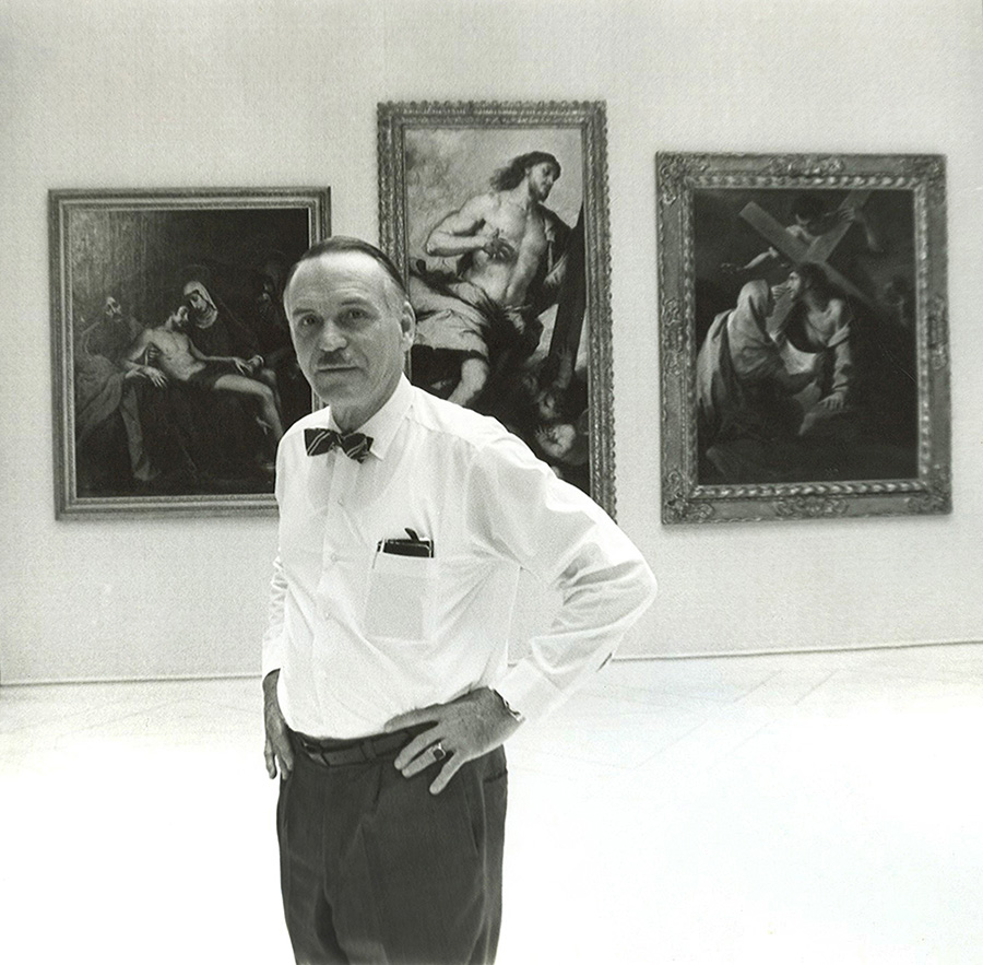 Luis A. Ferré stands in front of several works at Museo de Arte de Ponce